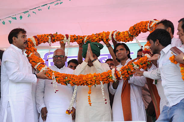GREATER NOIDA, INDIA - JUNE 29: Chief Minister of Bihar Nitish Kumar addresses a rally in which he lambasted on the central and state government demanding liquor ban at Jewar on June 29, 2016 in Greater Noida, India. Kumar targeted Prime Minister Narendra Modi for showing off Yoga and allowing sale of liquor. At anti-liquor rally, Kumar sought support of the residents of Uttar Pradesh to ban liquor. (Photo by Burhaan Kinu/Hindustan Times via Getty Images)