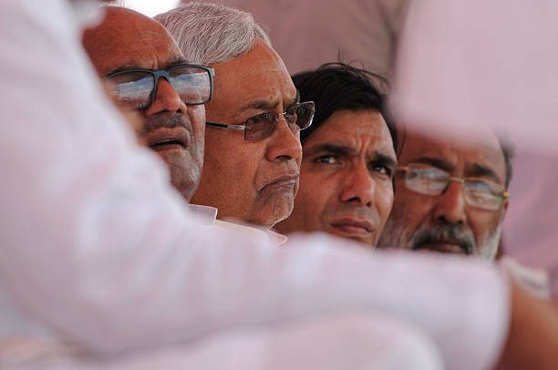 GREATER NOIDA, INDIA - JUNE 29: Chief Minister of Bihar Nitish Kumar addresses a rally in which he lambasted on the central and state government demanding liquor ban at Jewar on June 29, 2016 in Greater Noida, India. Kumar targeted Prime Minister Narendra Modi for showing off Yoga and allowing sale of liquor. At anti-liquor rally, Kumar sought support of the residents of Uttar Pradesh to ban liquor. (Photo by Burhaan Kinu/Hindustan Times via Getty Images)